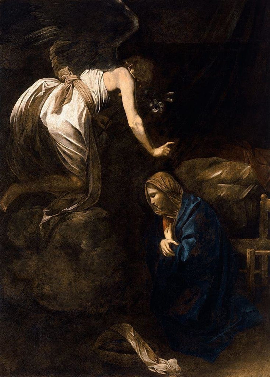 Caravaggio’s Annunciation trades the dramatic light of his Roman period for a softer, more introspective spirituality